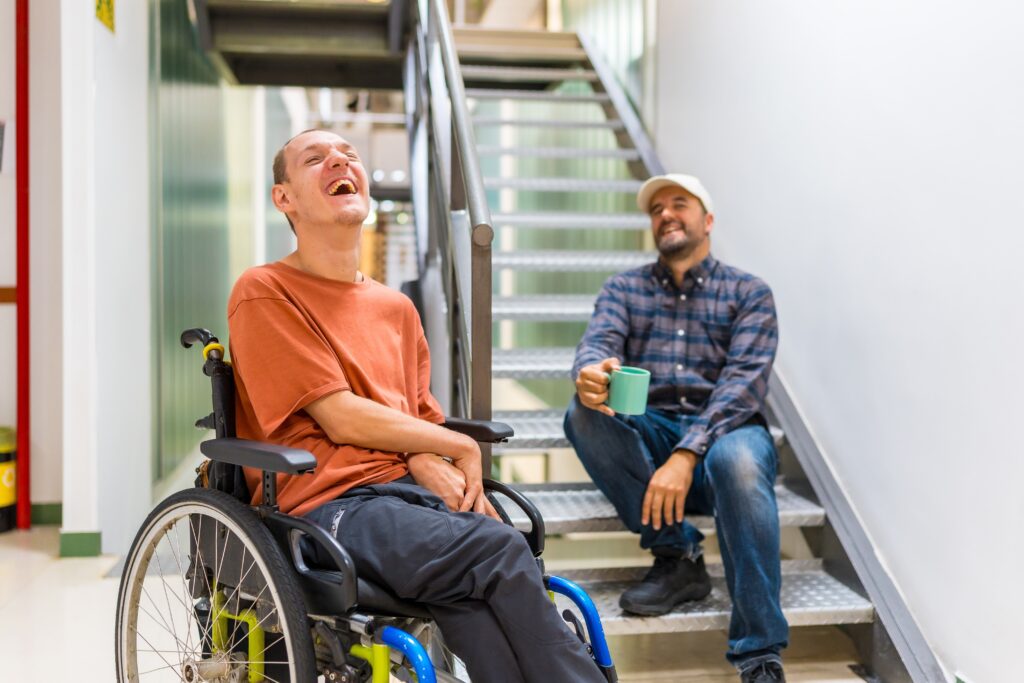 adult male with IDD in a wheelchair at a adult program