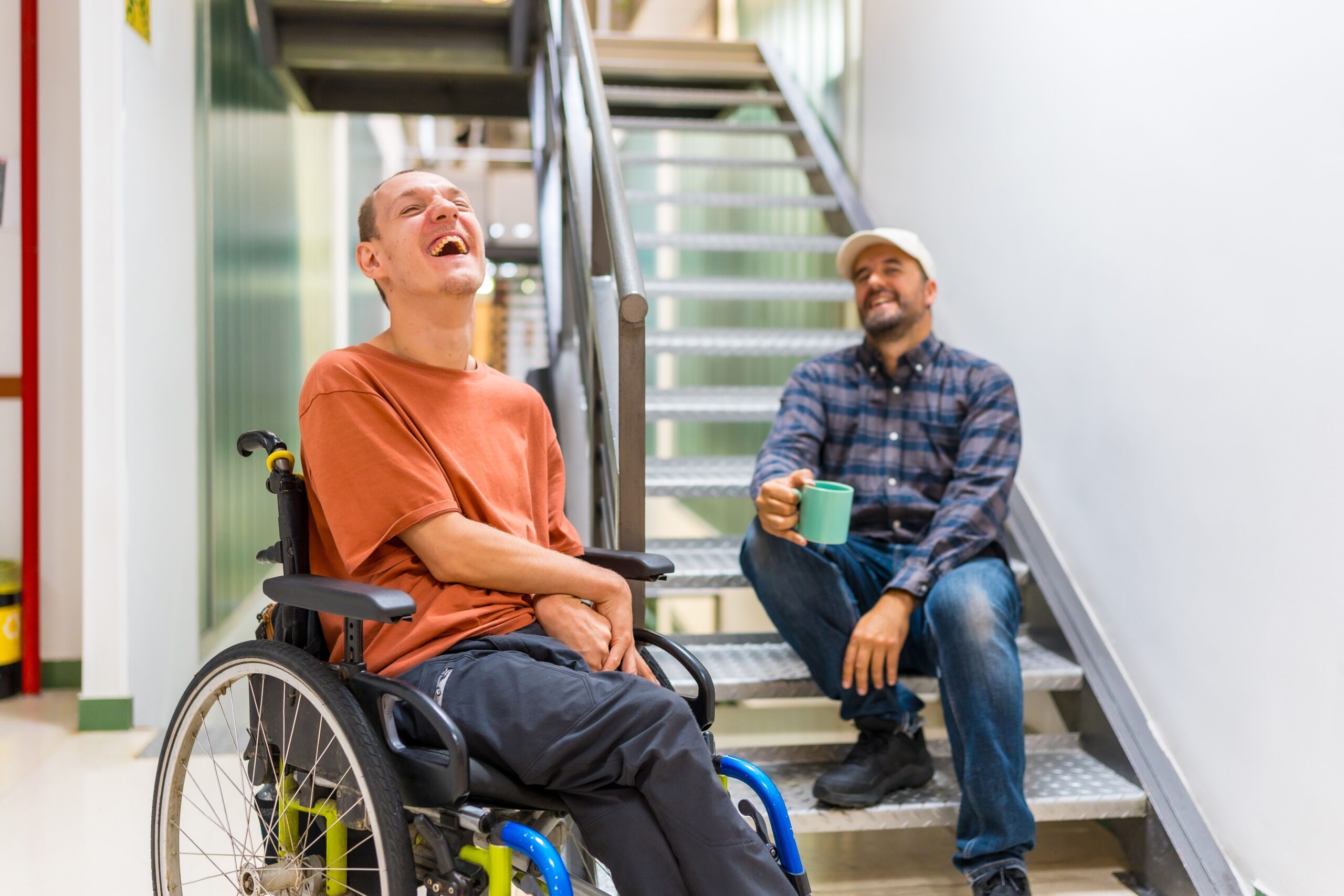 adult male with IDD in a wheelchair at a adult program