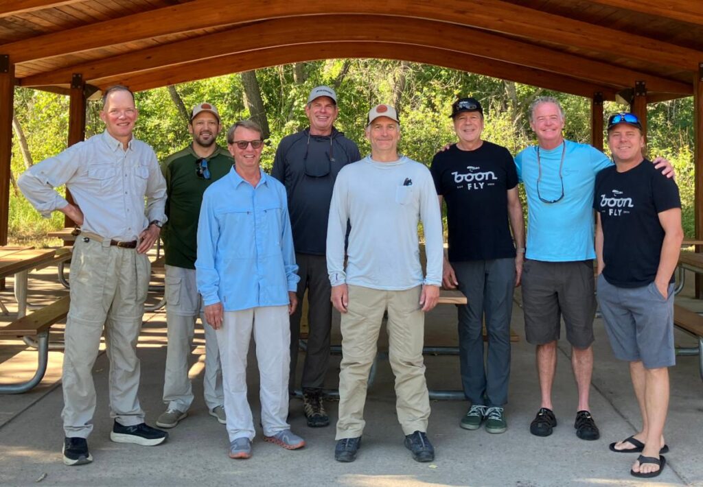 Boon Fly fishers under a gazebo who do inclusive recreation for those with IDD