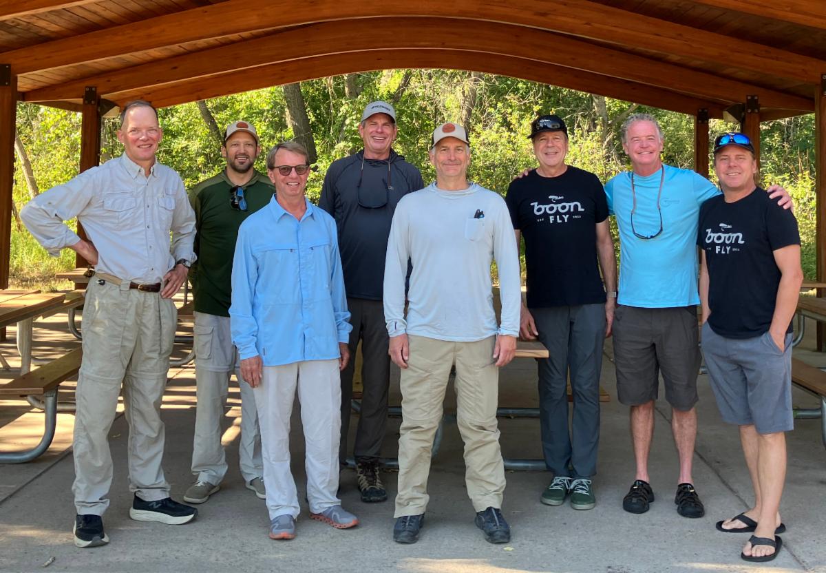 Boon Fly fishers under a gazebo who do inclusive recreation for those with IDD