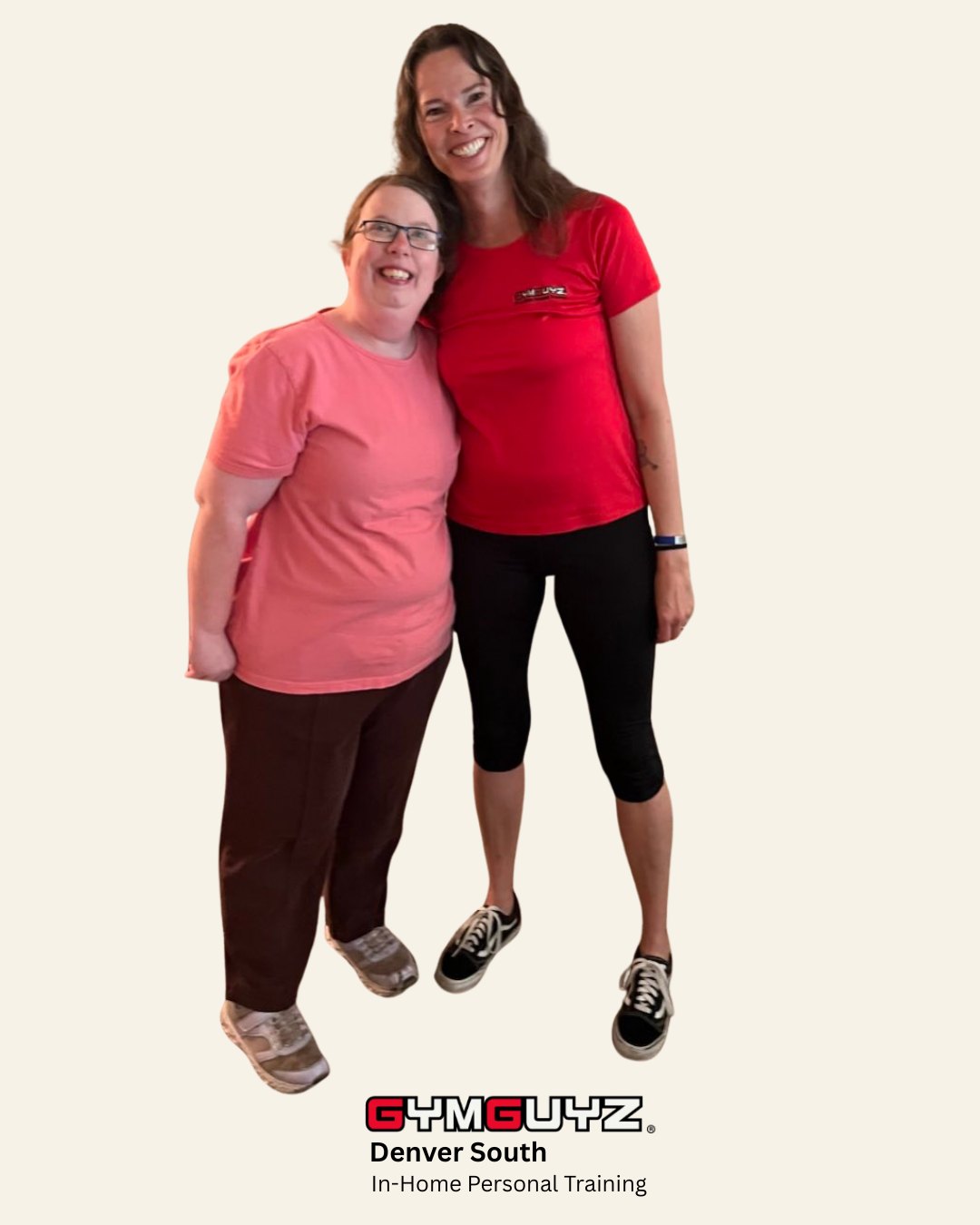 Amanda and her personal trainer Ruth stand side by side with their arms around each other, both smiling. Ruth wears a red GYMGUYZ Denver South shirt.